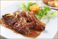 Đùi vịt quay xốt me