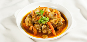 Gà kho nghệ chua cay