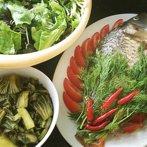 Cách nấu lẩu cá chép dưa cải chua