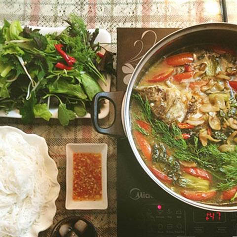 Cách nấu lẩu cá chép dưa cải chua