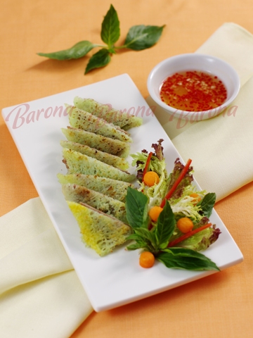 Thịt heo bọc trứng cút nướng sốt xá xíu